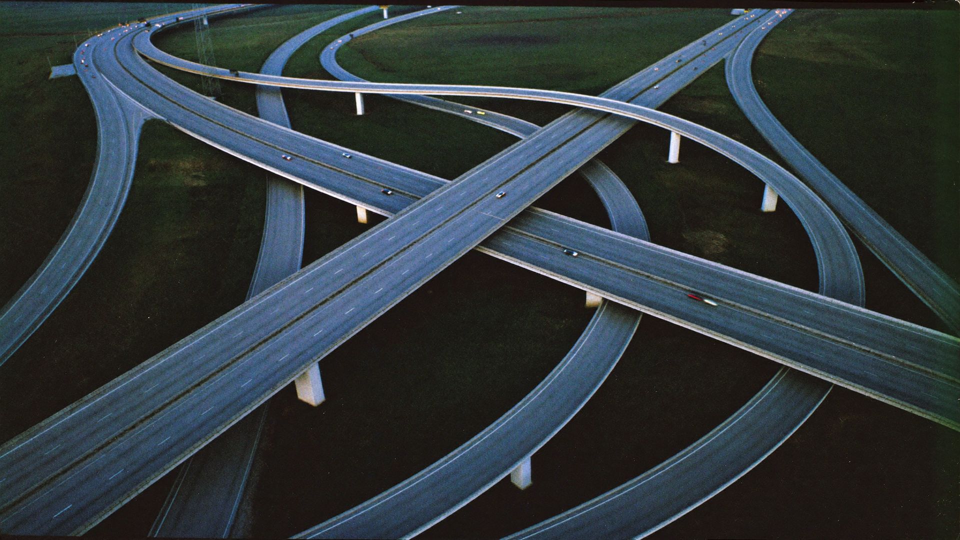 Aerial view of a highway interchange at dusk